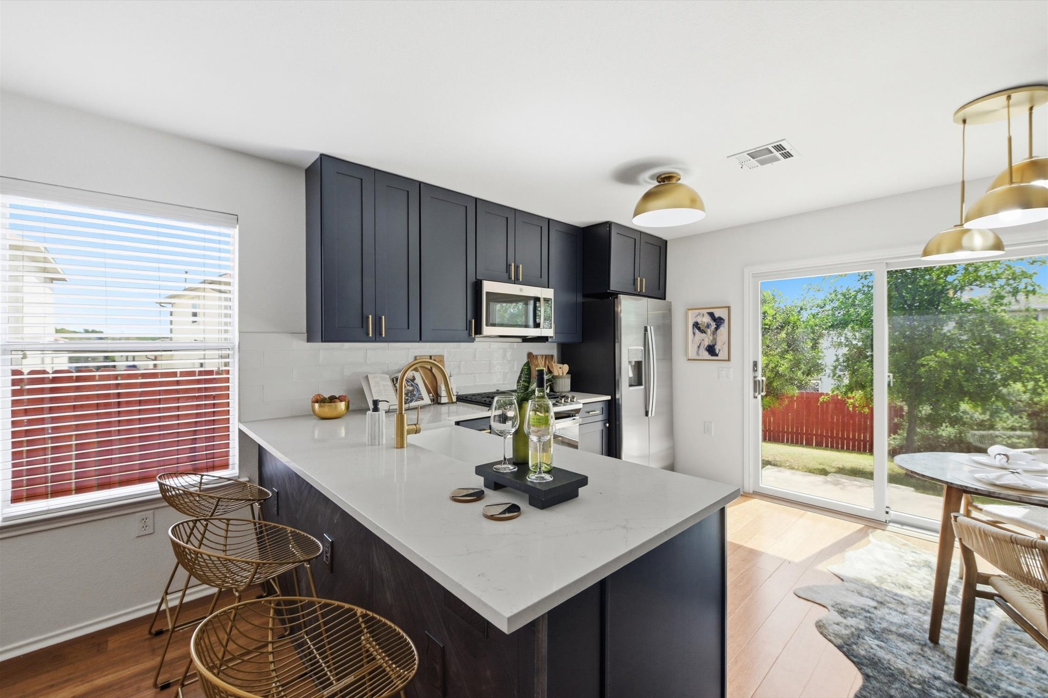 5321 Tower Trail Austin, TX 78723 - Photo 10 of 22 a kitchen with a table chairs and microwave