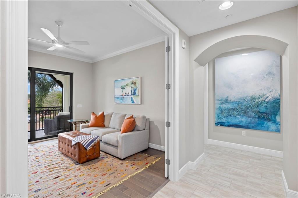 16449 Carrara Way, Unit 101 Naples, FL 34110 - Photo 24 of 35 Study/Den with wood plank flooring.