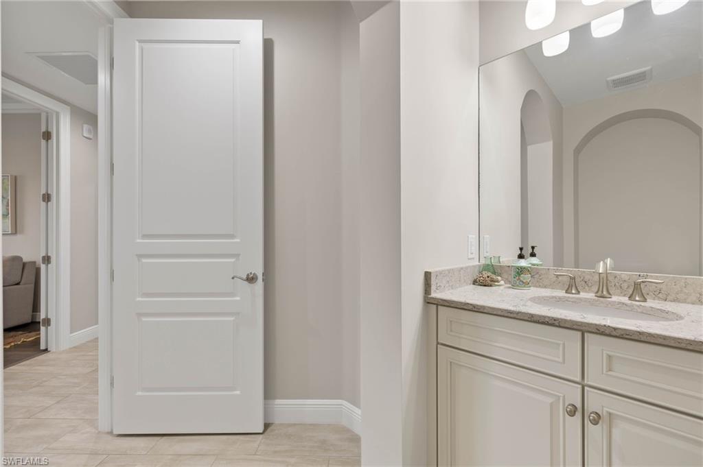 16449 Carrara Way, Unit 101 Naples, FL 34110 - Photo 25 of 35 Powder Bathroom