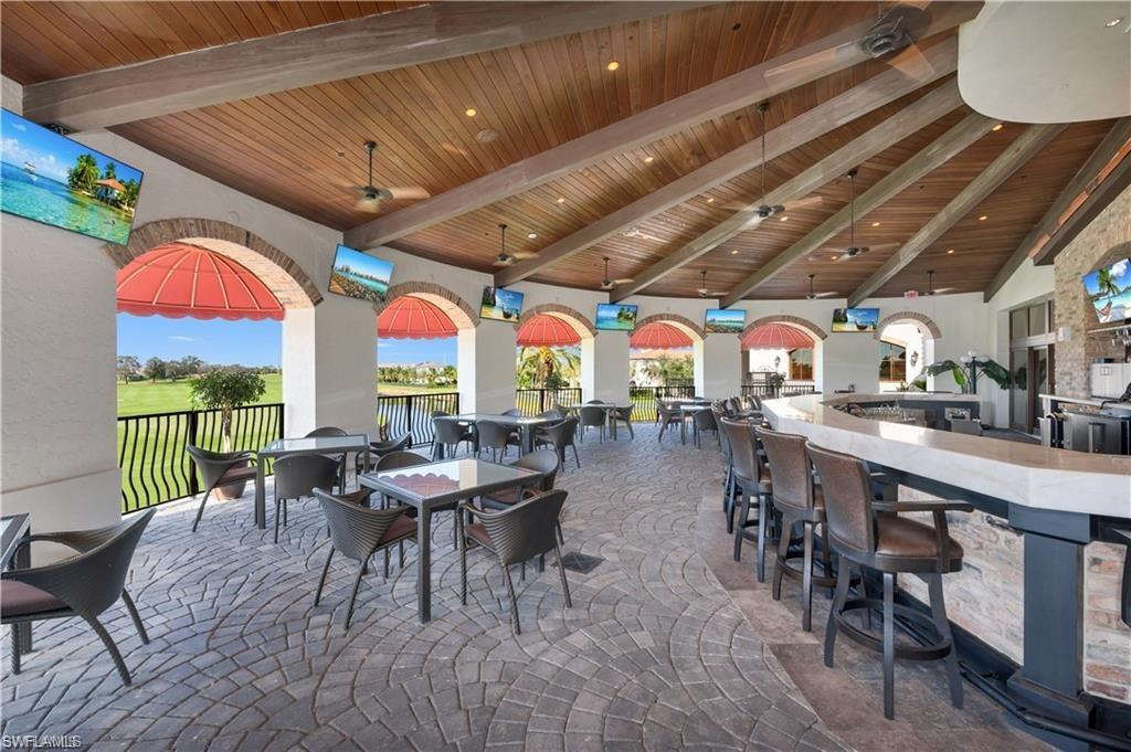 16449 Carrara Way, Unit 101 Naples, FL 34110 - Photo 29 of 35 Talis Park Clubhouse Rotunda Bar.