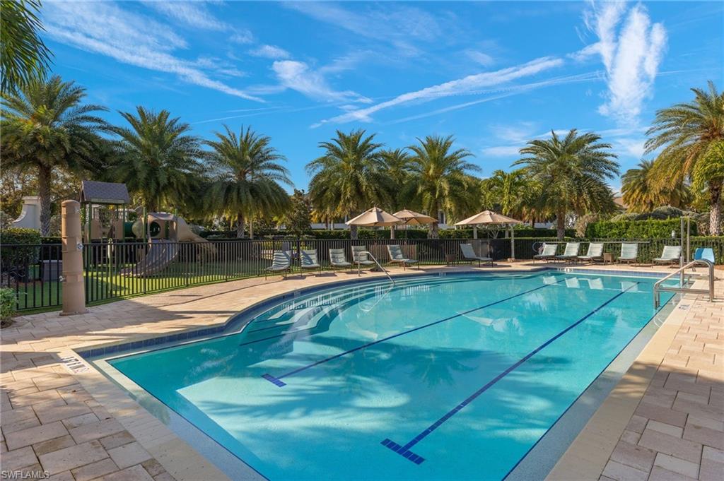 16449 Carrara Way, Unit 101 Naples, FL 34110 - Photo 34 of 35 Talis Park Community Lap Pool at the Sports Complex.