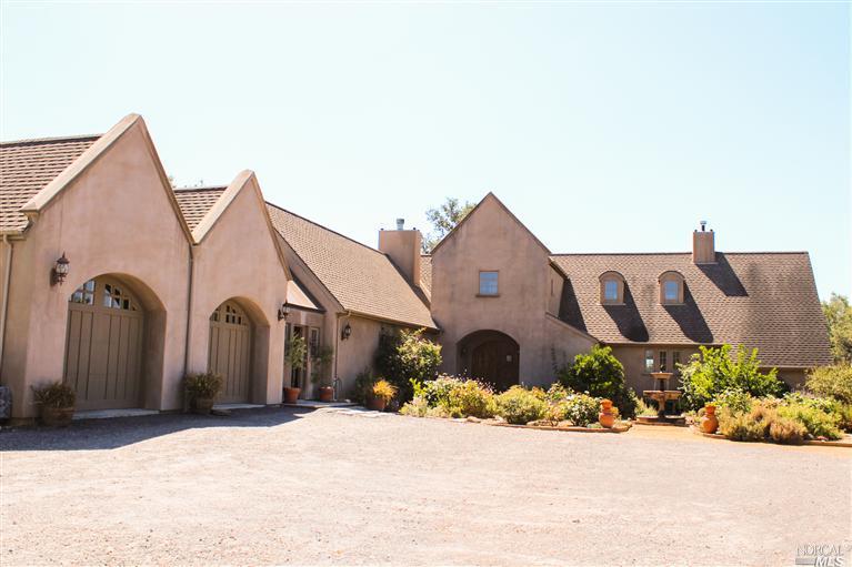1740 Lytton Springs Road Healdsburg, CA 95448 - Photo 1 of 1 Country French Manor is surrounded by a rose garden with over 20 varieties of roses, producing olive trees, a variety of fruit trees, and several table grape vines
