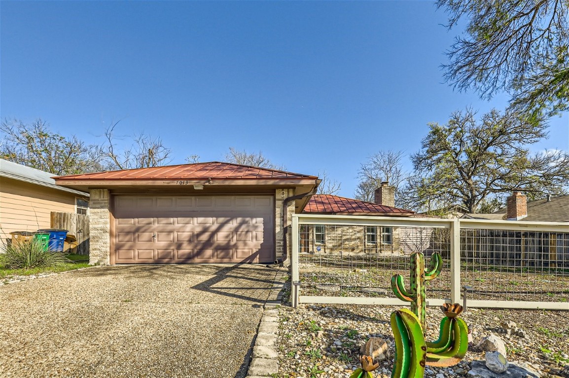 7013 Mt Carrell Drive Austin, TX 78745 - Photo 1 of 1 a view of a car garage