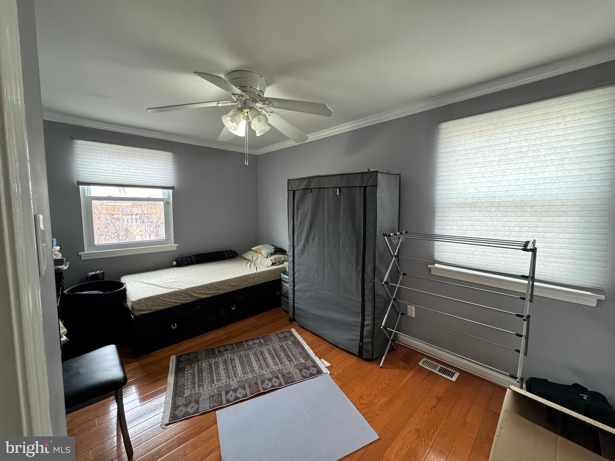 10100 Galahad Road Philadelphia, PA 19116 - Photo 13 of 17 a bedroom with a bed and a chandelier
