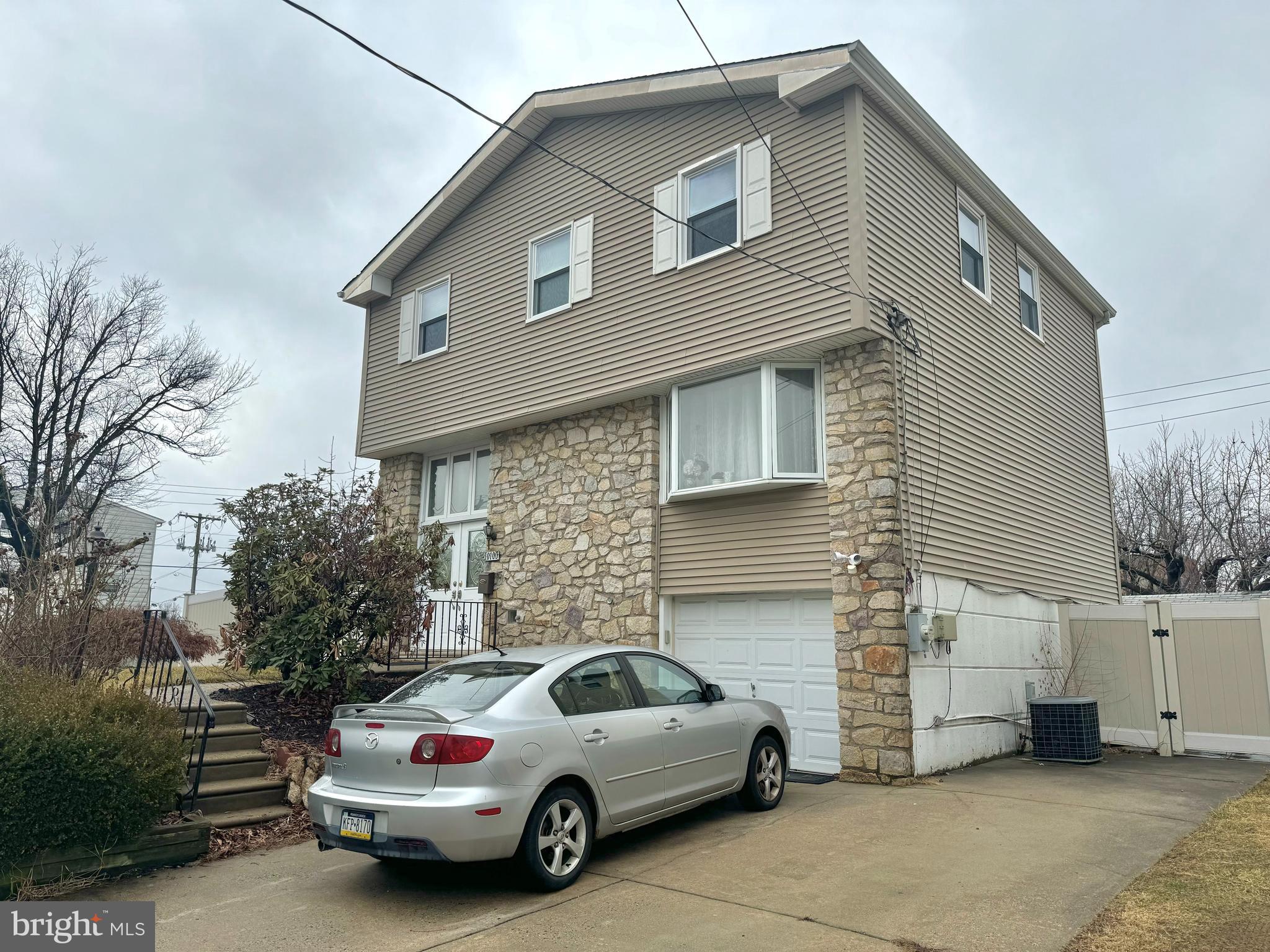 10100 Galahad Road Philadelphia, PA 19116 - Photo 2 of 17 a view of a car park in front of house
