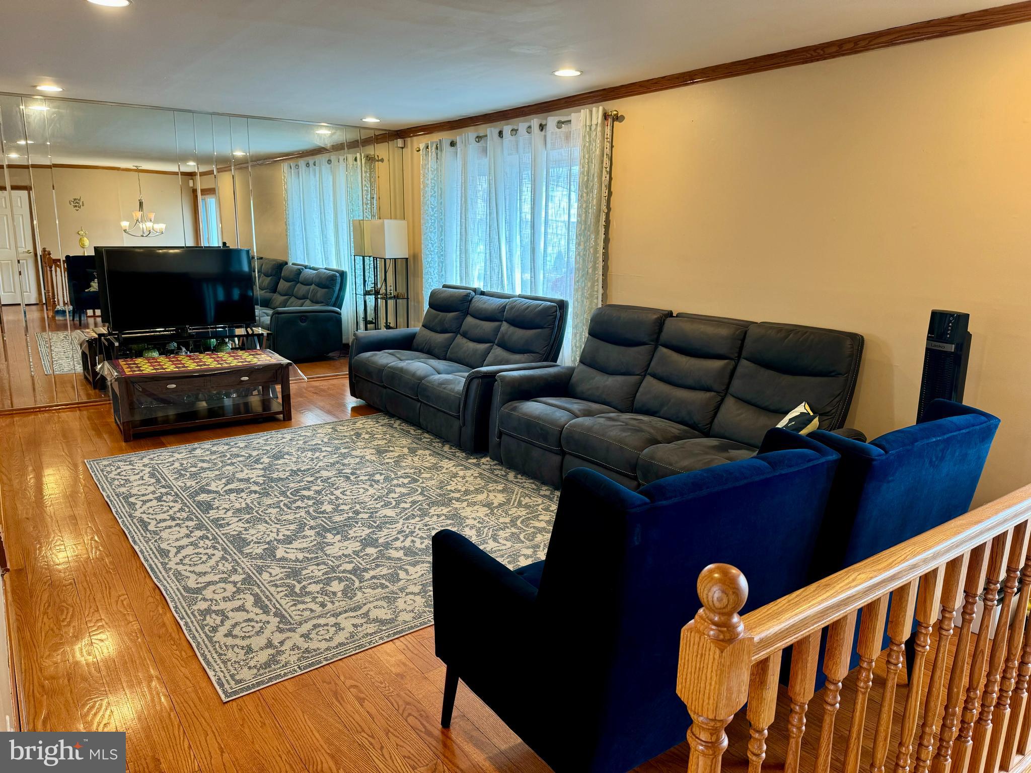 10100 Galahad Road Philadelphia, PA 19116 - Photo 3 of 17 a living room with furniture and a flat screen tv
