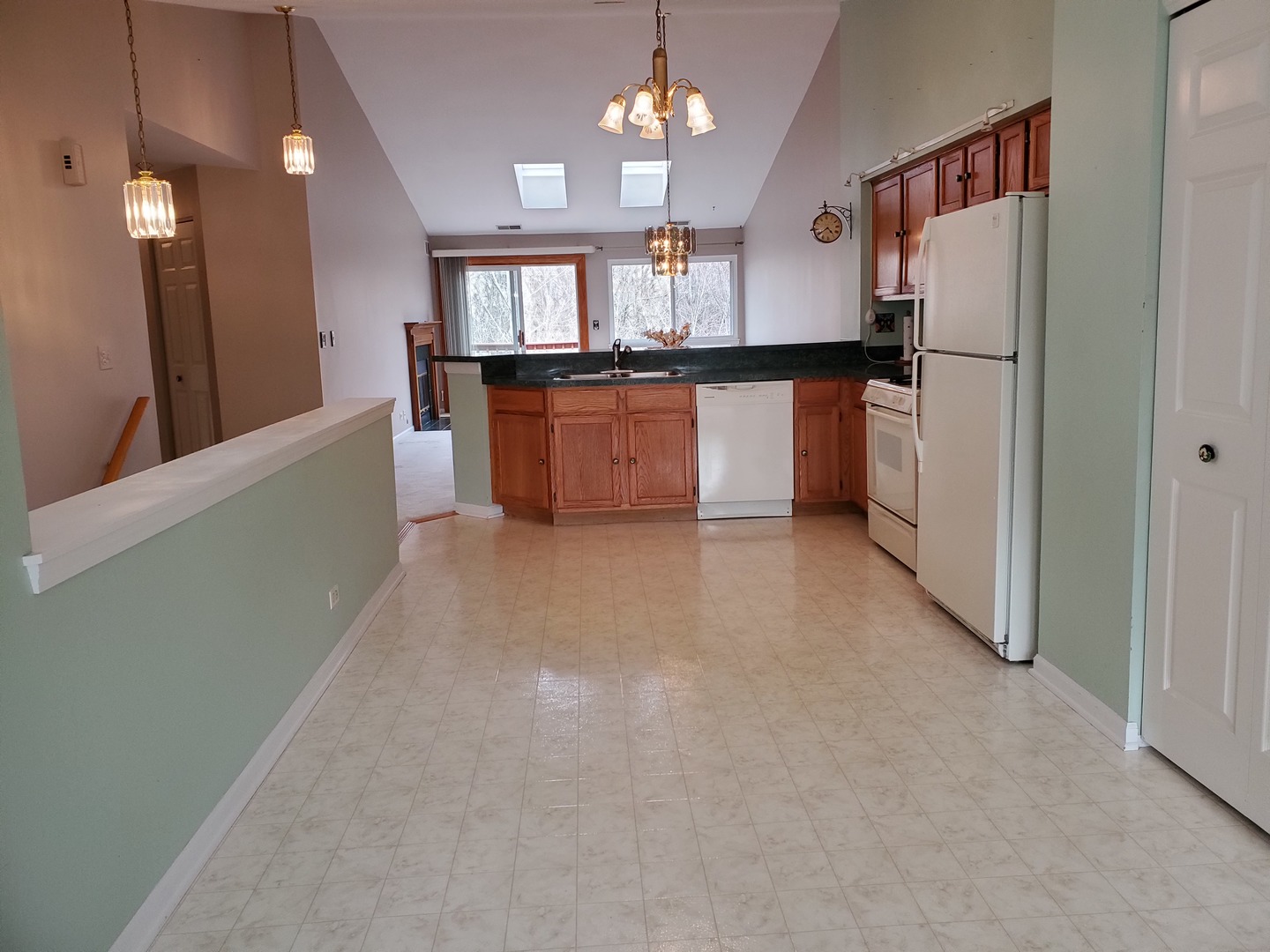 8225 Ripple Ridge, Unit 8225 Darien, IL 60561 - Photo 7 of 21 a large kitchen with cabinets and stainless steel appliances