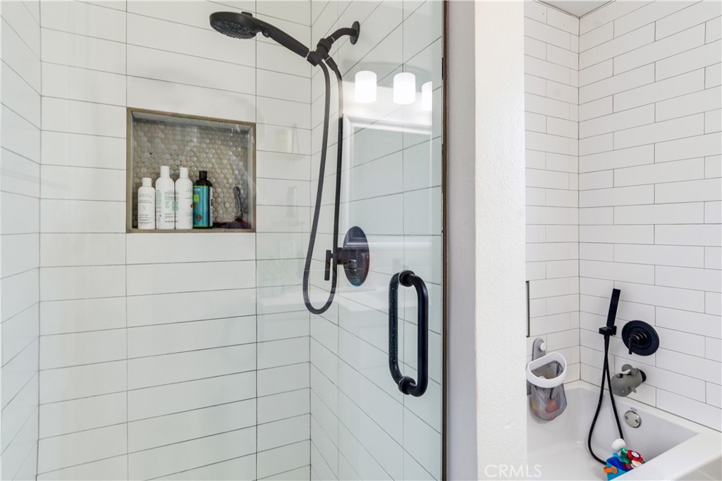 6755 Rainier Court Riverside, CA 92506 - Photo 15 of 23 a bathroom with a shower