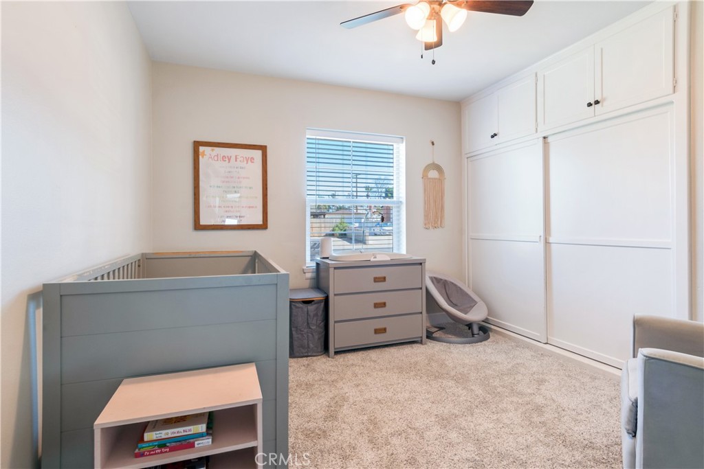 6755 Rainier Court Riverside, CA 92506 - Photo 16 of 23 a bedroom with a workspace