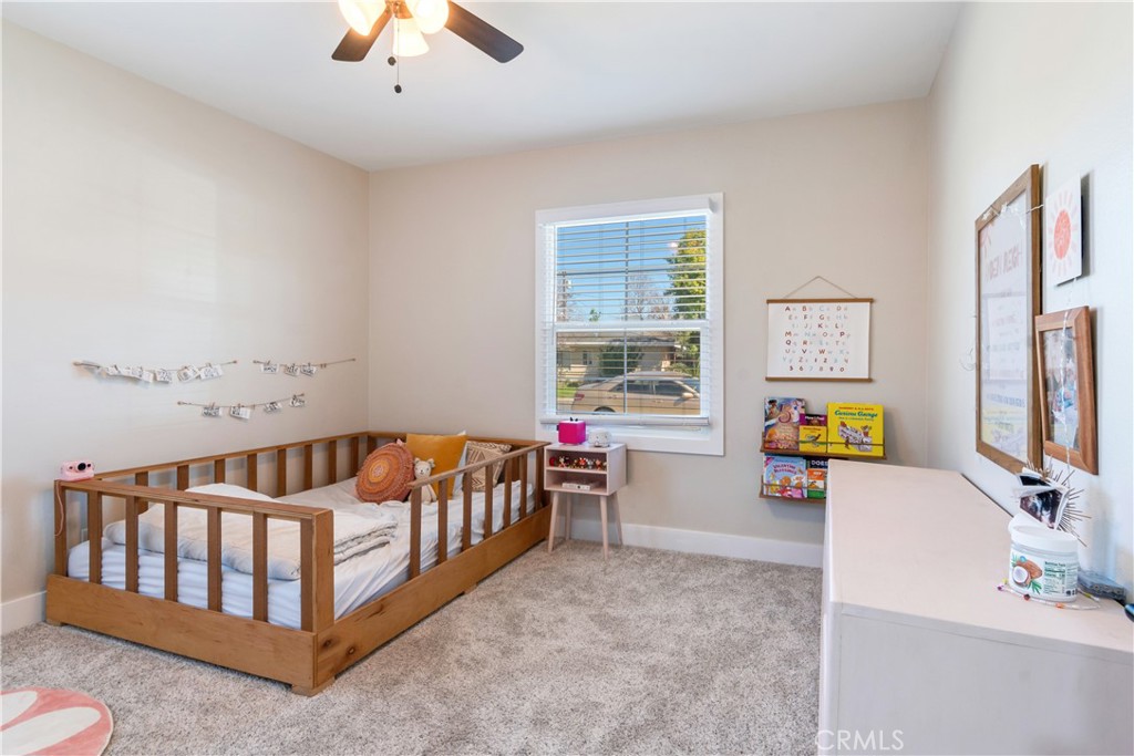 6755 Rainier Court Riverside, CA 92506 - Photo 17 of 23 a bathroom with a bathtub and a sink