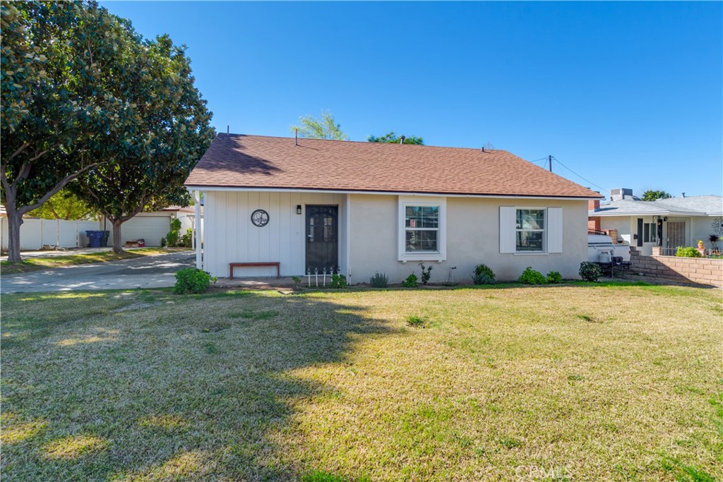 6755 Rainier Court Riverside, CA 92506 - Photo 2 of 23 a front view of house with yard and trees