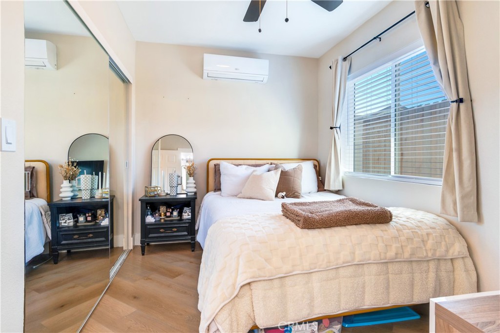 6755 Rainier Court Riverside, CA 92506 - Photo 22 of 23 a bedroom with bed and window