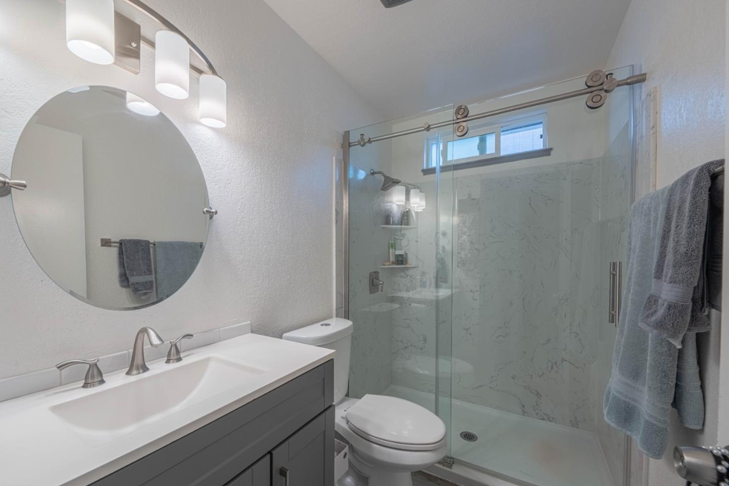 8340 Forest Street Gilroy, CA 95020 - Photo 21 of 30 a bathroom with a sink a toilet and shower