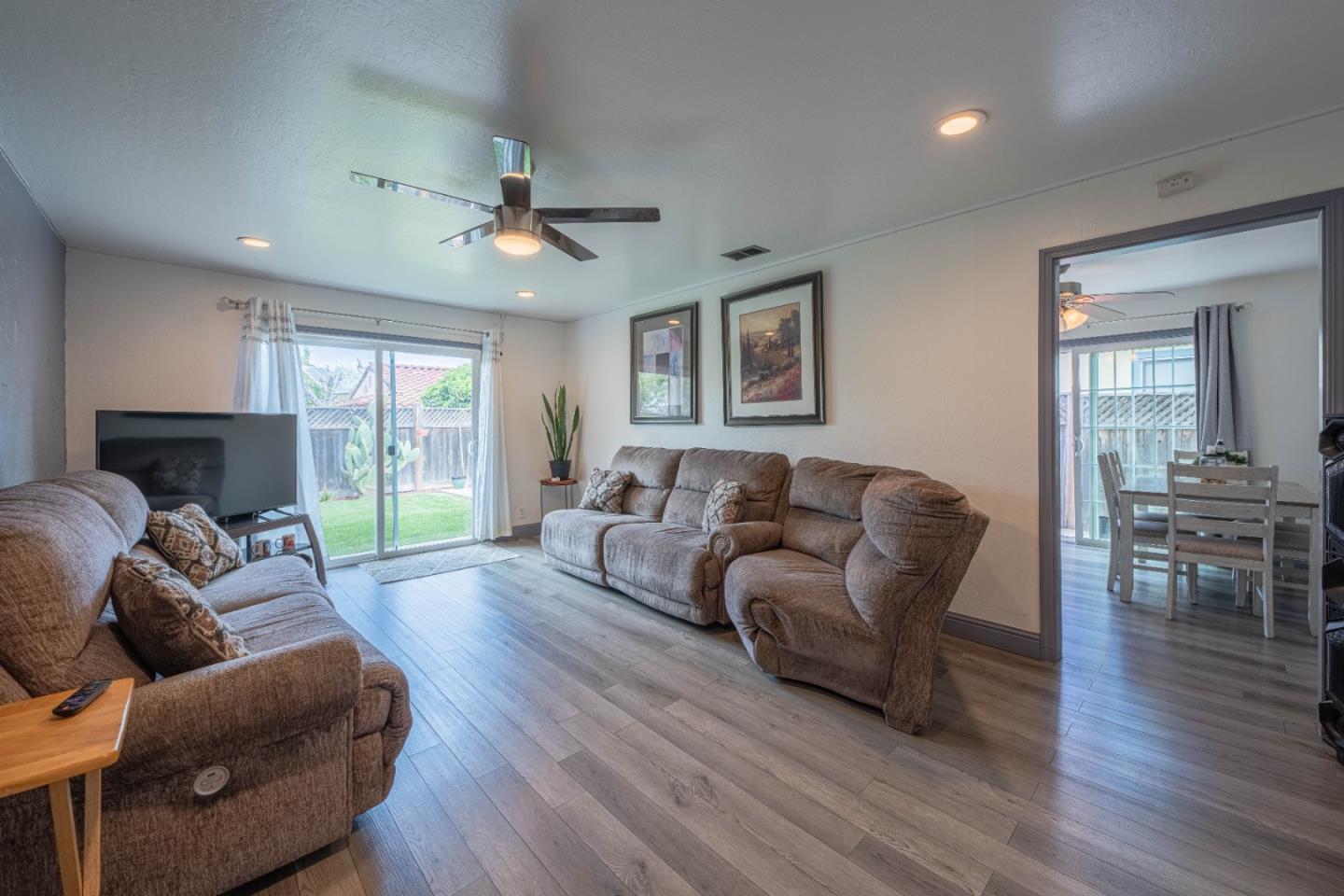 8340 Forest Street Gilroy, CA 95020 - Photo 5 of 30 a living room with furniture and a fireplace