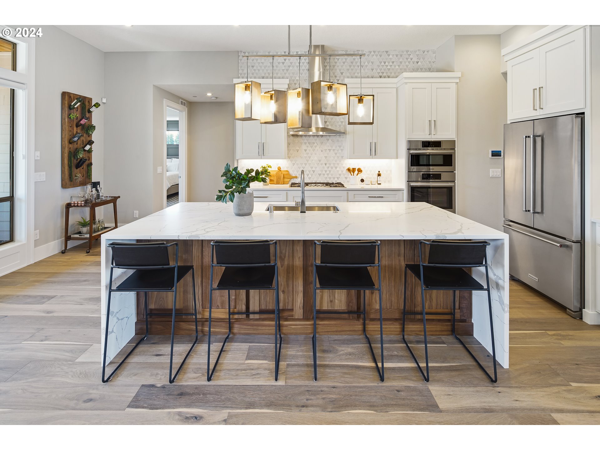 17711 Northeast 25th Avenue, Unit LOT 8 Ridgefield, WA 98642 - Photo 11 of 39 a view of a dining room with furniture and wooden floor