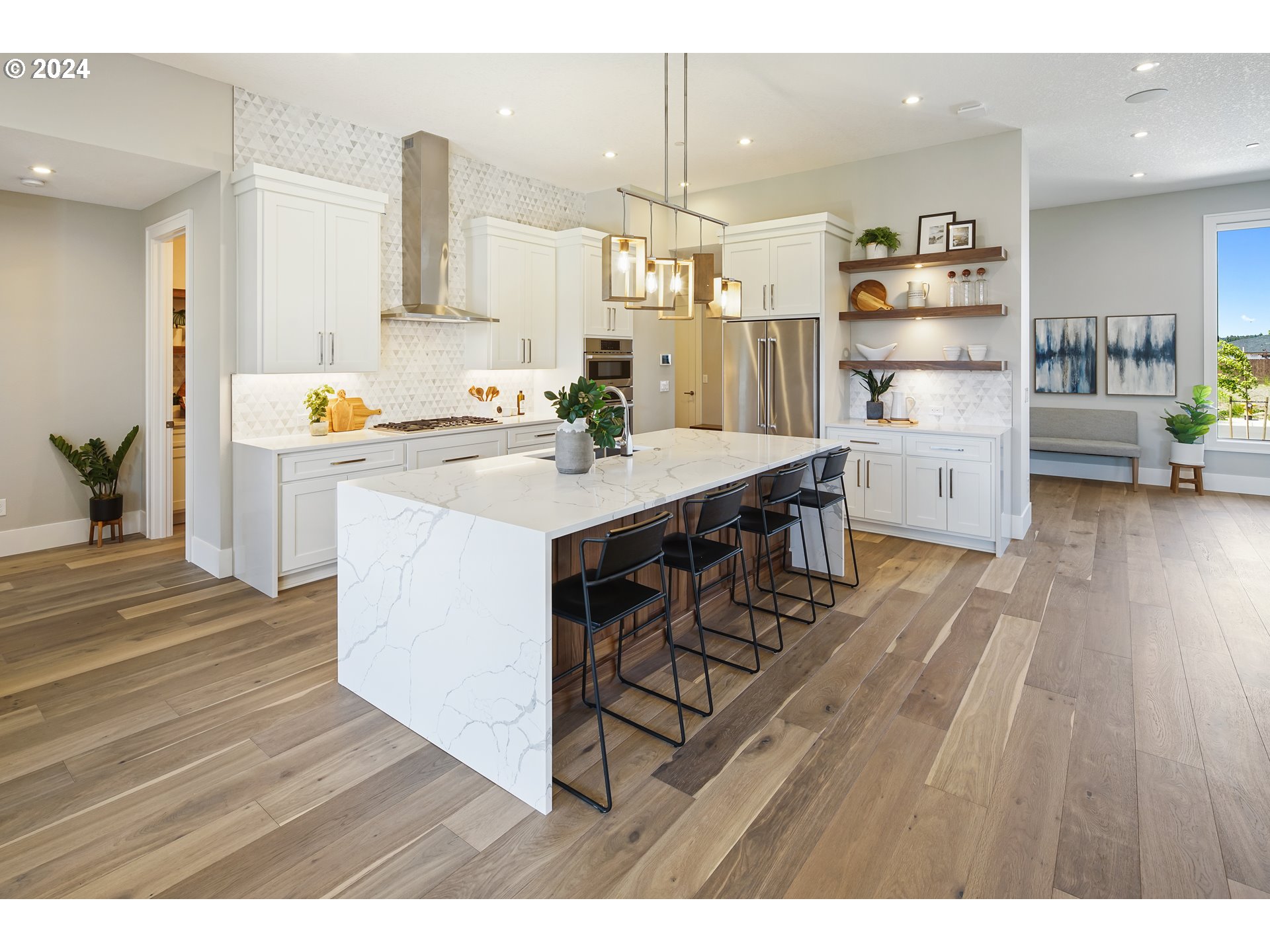 17711 Northeast 25th Avenue, Unit LOT 8 Ridgefield, WA 98642 - Photo 12 of 39 a kitchen with wooden floors and appliances