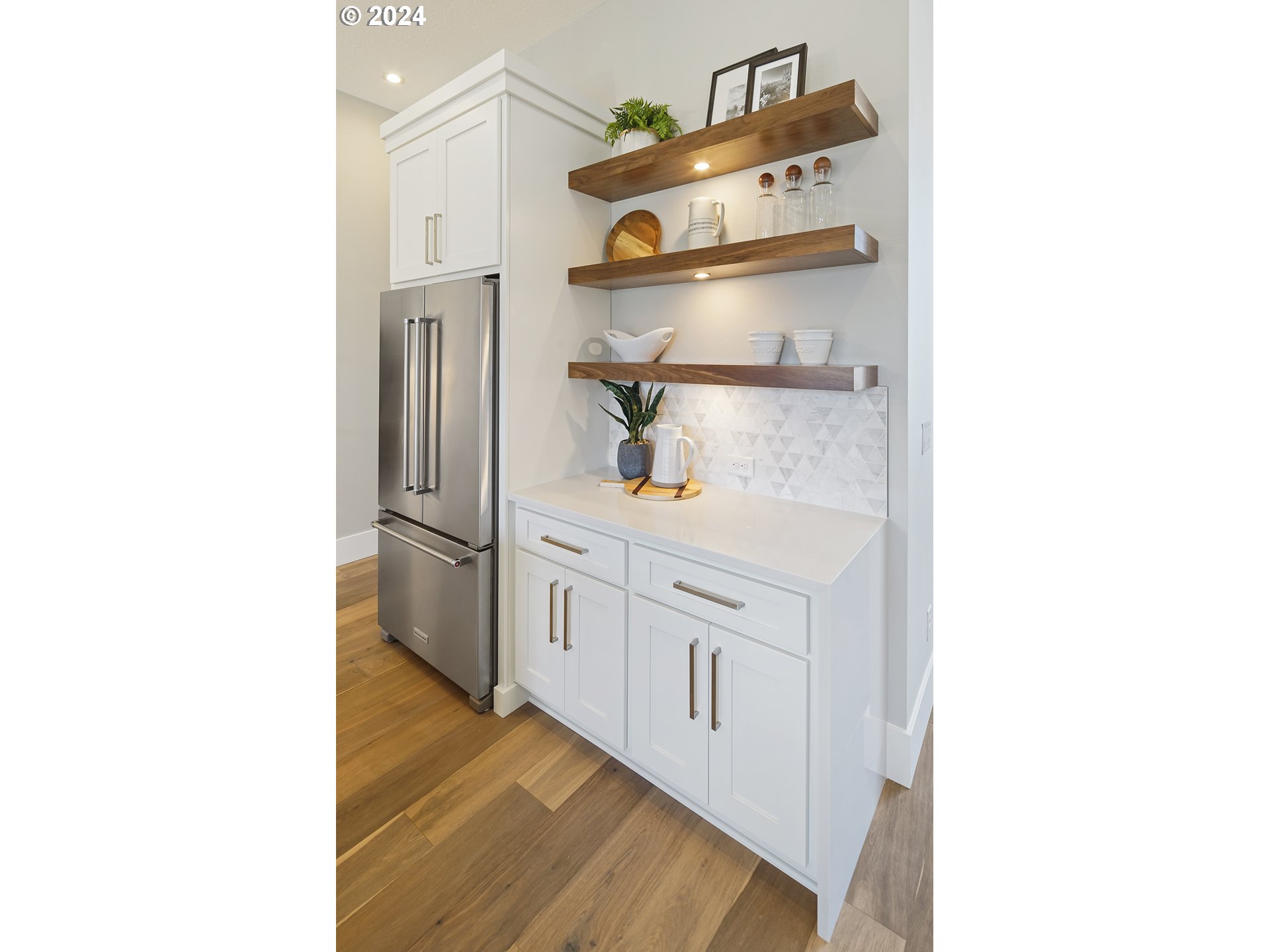 17711 Northeast 25th Avenue, Unit LOT 8 Ridgefield, WA 98642 - Photo 15 of 39 a kitchen with white cabinets and window