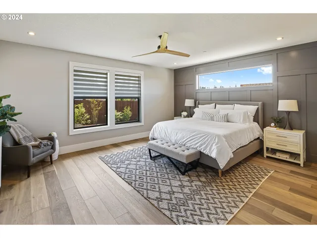 a bedroom with a bed and a couch