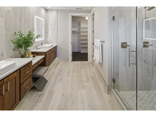 a bathroom with a sink and a shower