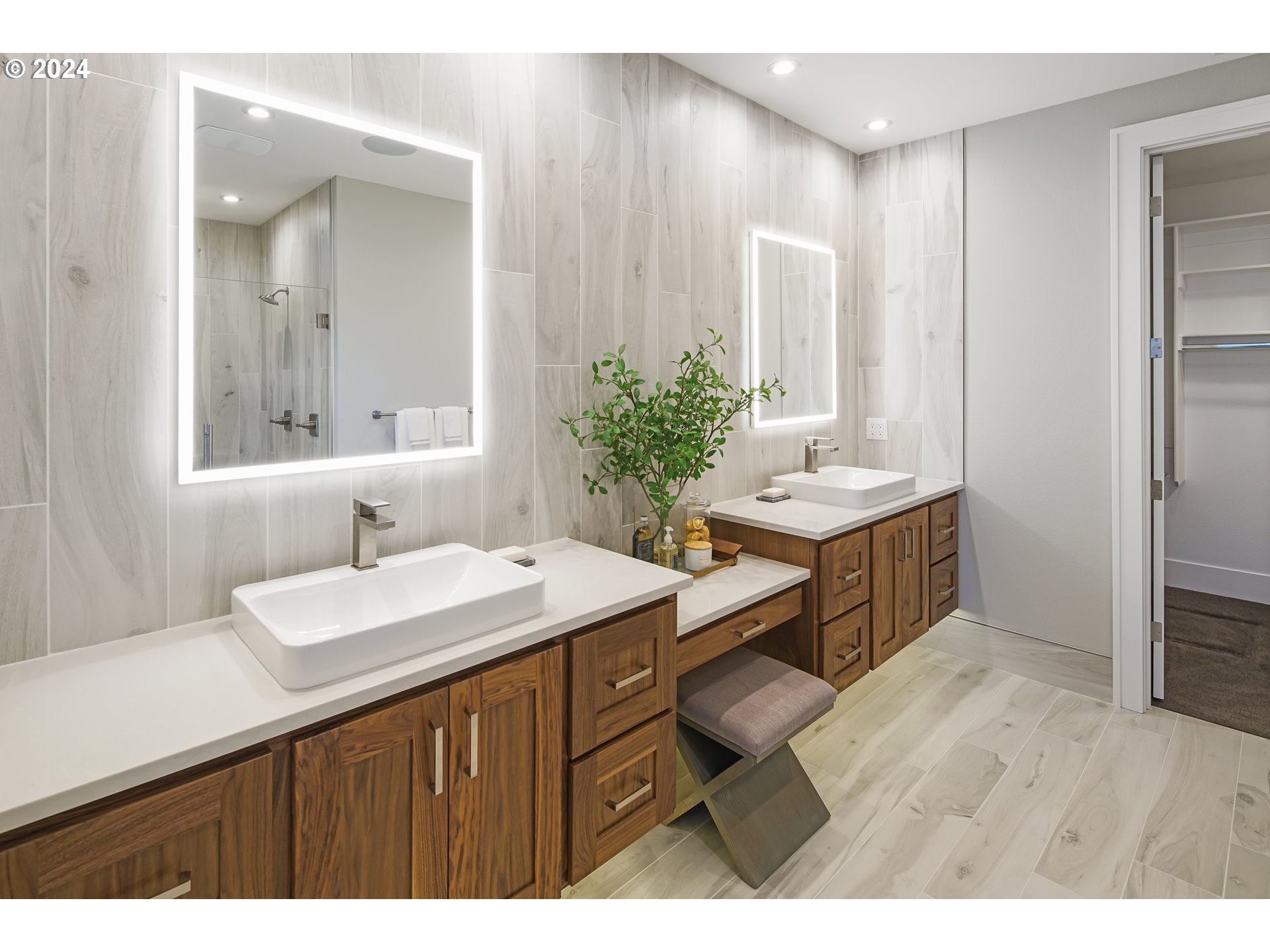 17711 Northeast 25th Avenue, Unit LOT 8 Ridgefield, WA 98642 - Photo 21 of 39 a bathroom with a sink and a mirror