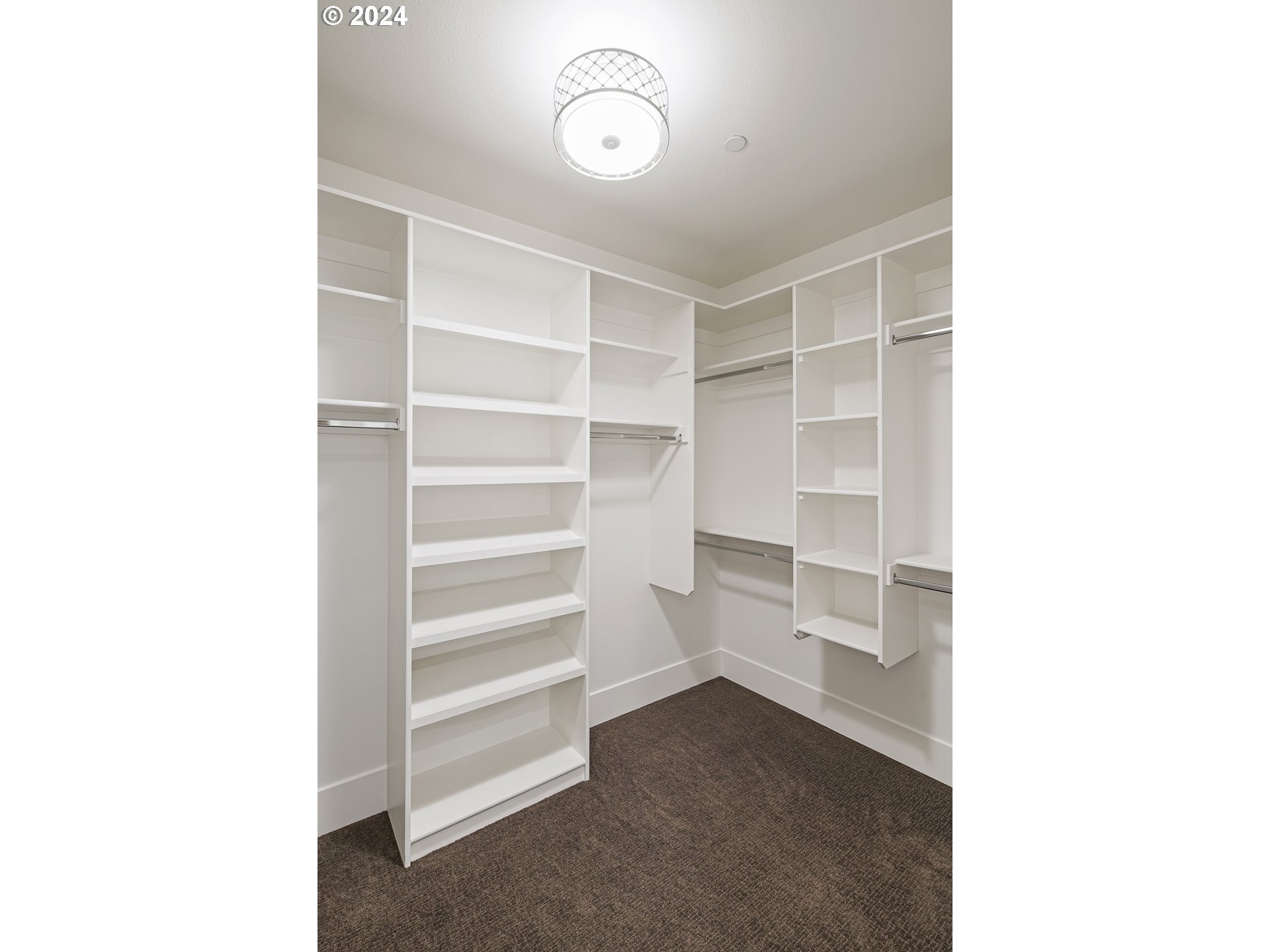 17711 Northeast 25th Avenue, Unit LOT 8 Ridgefield, WA 98642 - Photo 25 of 39 a view of a room with storage and racks