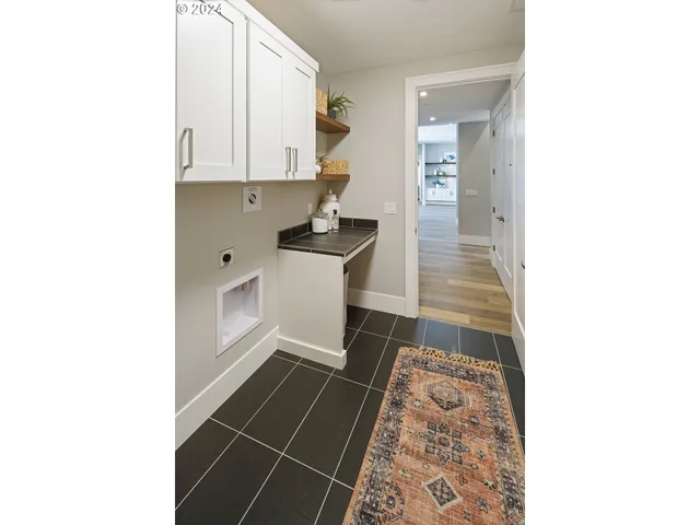 a balcony with table and chairs