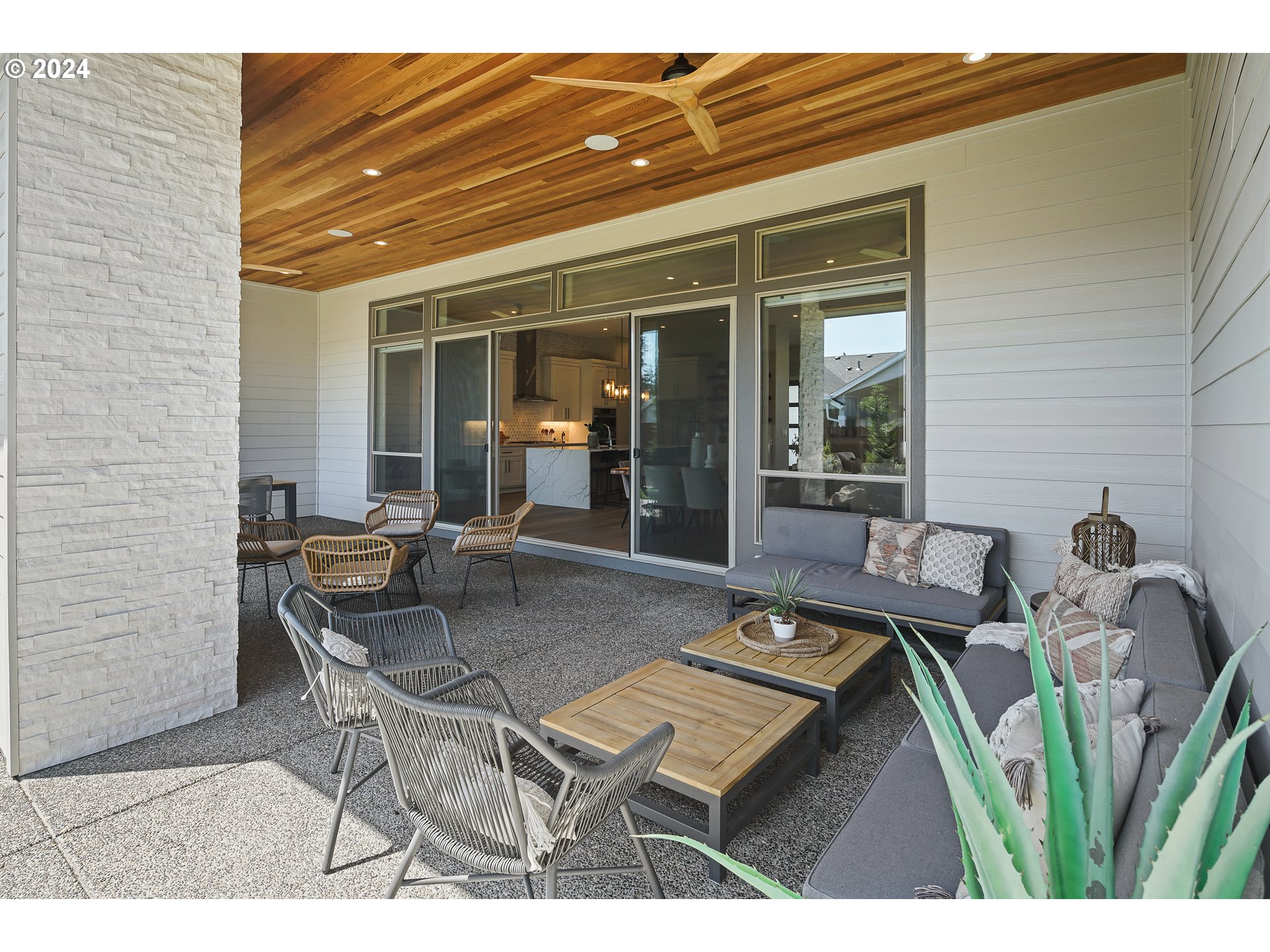 17711 Northeast 25th Avenue, Unit LOT 8 Ridgefield, WA 98642 - Photo 34 of 39 a balcony with table and chairs
