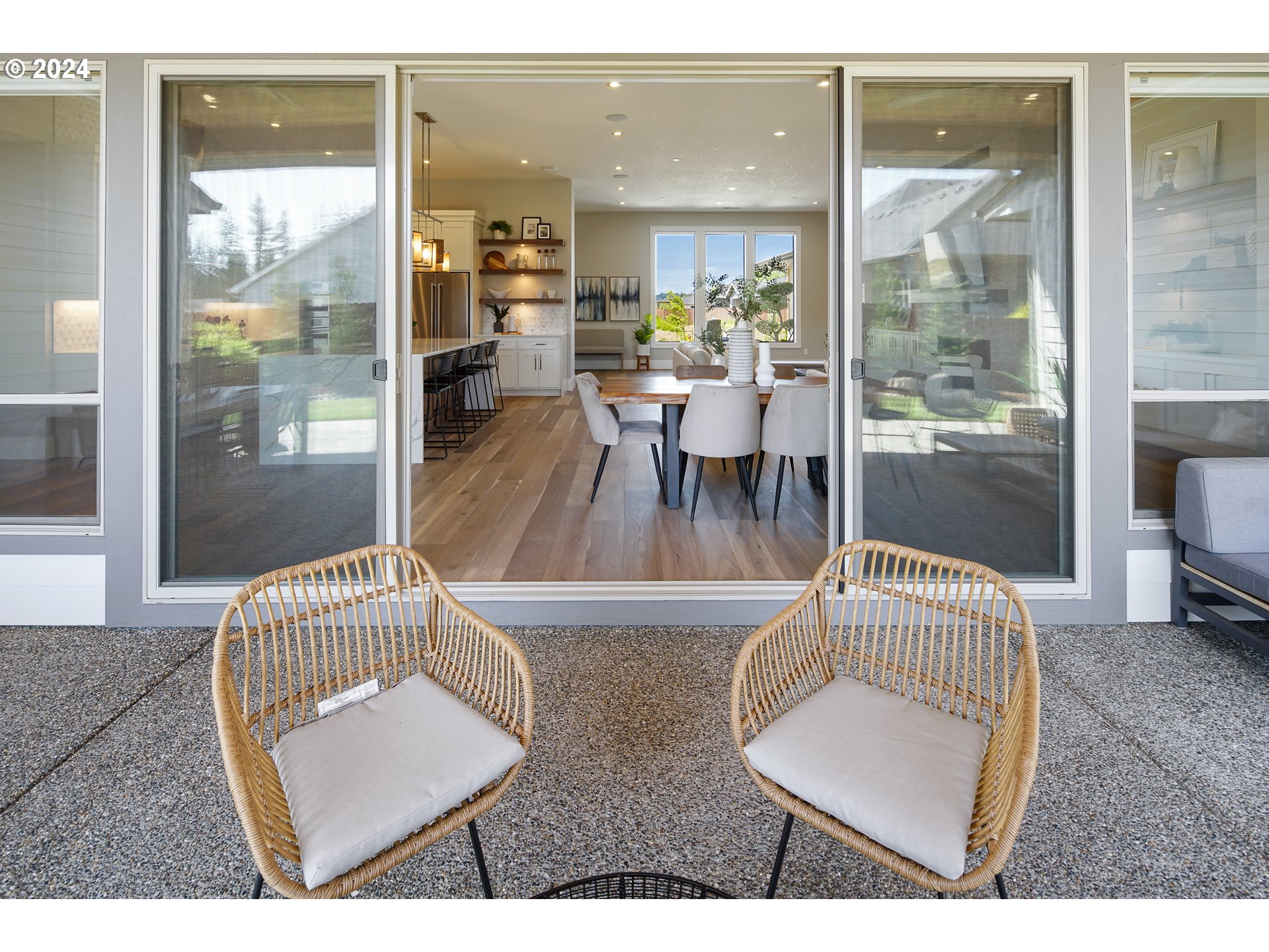 17711 Northeast 25th Avenue, Unit LOT 8 Ridgefield, WA 98642 - Photo 36 of 39 a living room with furniture and a large window