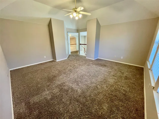 a view of a porch with wooden floor