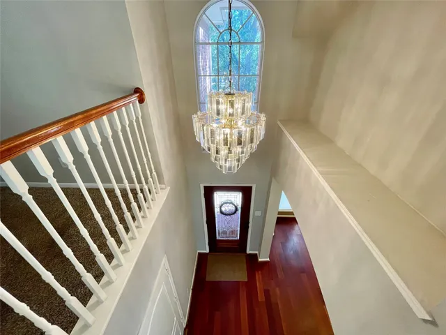a view of entryway with wooden floor