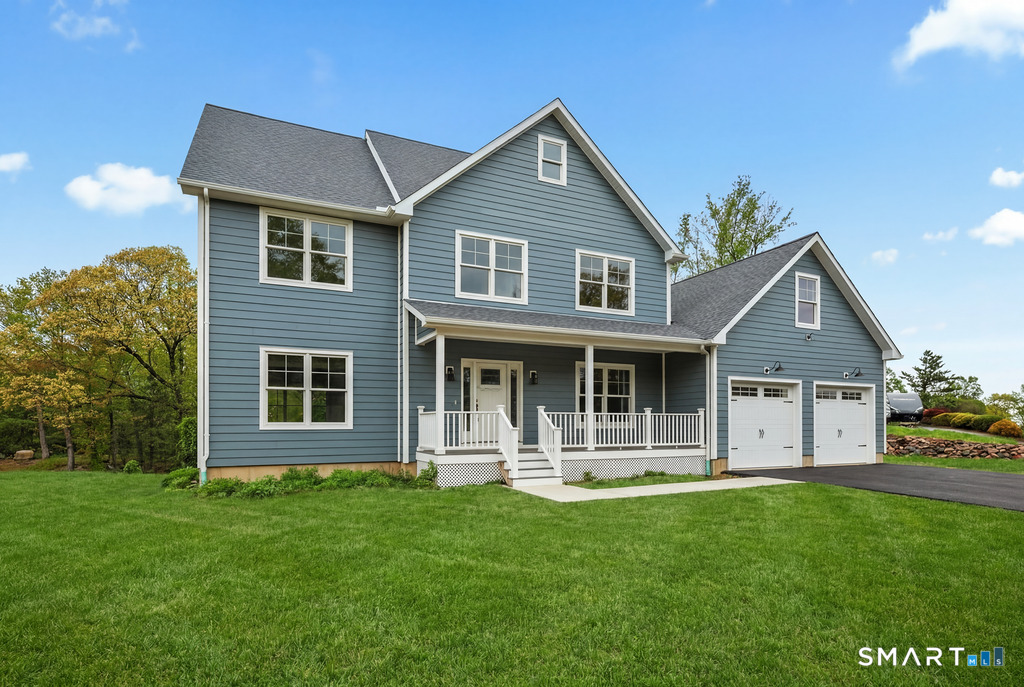 8 Ridgewood Club Road Prospect, CT 06712 - Photo 2 of 40 a front view of a house with a yard