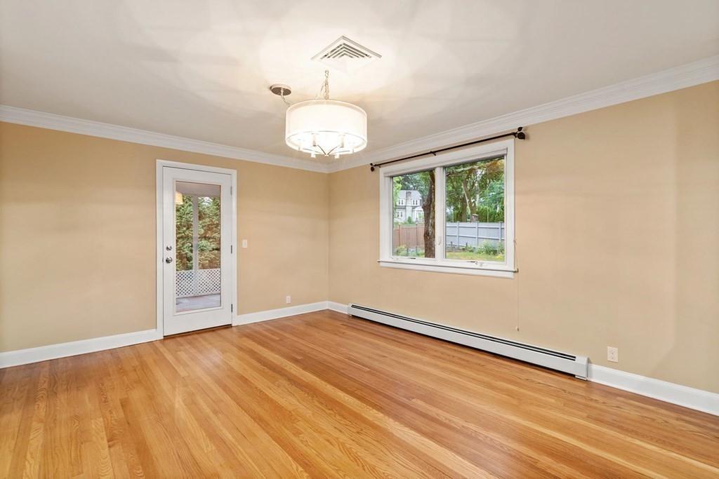 40 Helene Road Newton, MA 02468 - Photo 13 of 27 a view of an empty room with wooden floor and a window