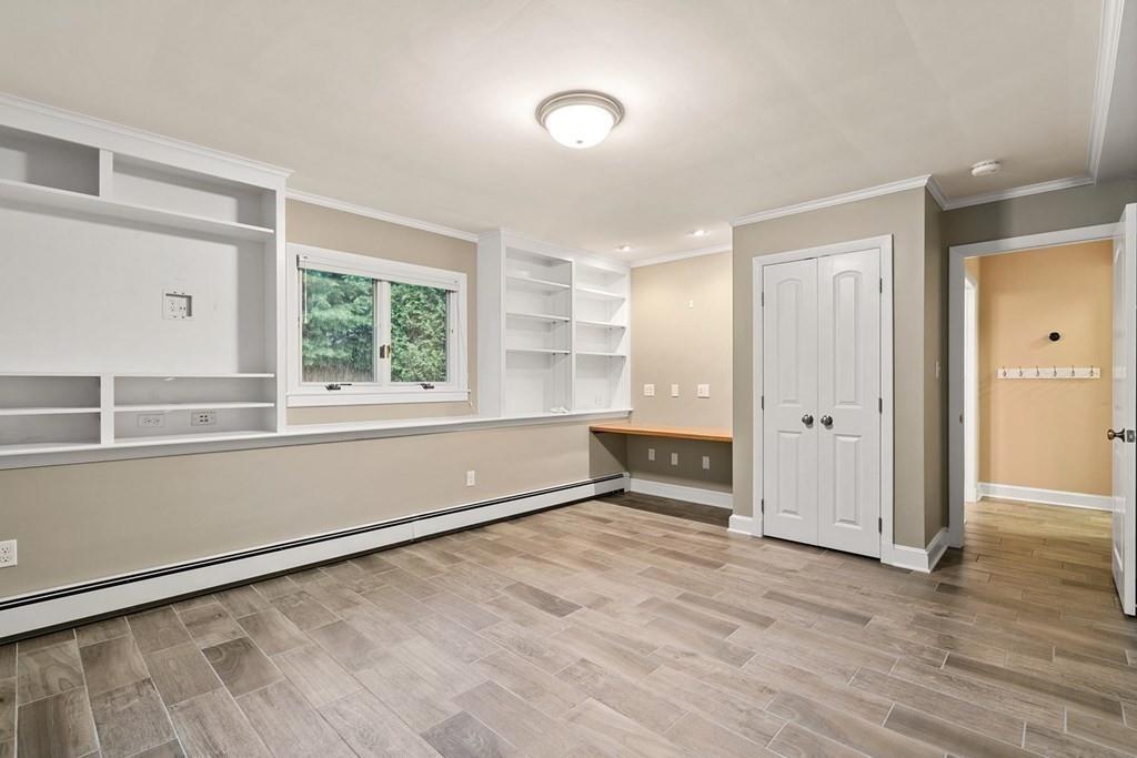 40 Helene Road Newton, MA 02468 - Photo 22 of 27 a view of an empty room with a window