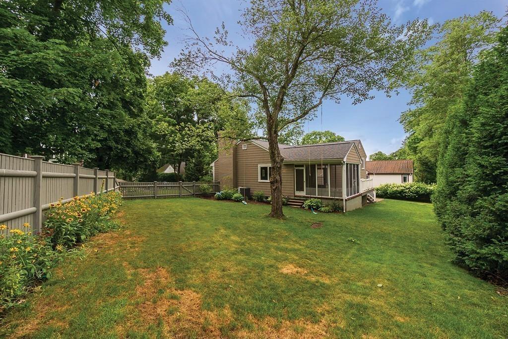 40 Helene Road Newton, MA 02468 - Photo 24 of 27 a front view of house with yard and green space