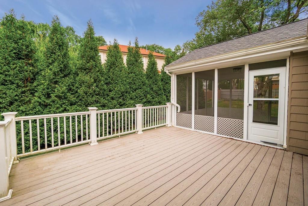 40 Helene Road Newton, MA 02468 - Photo 25 of 27 a view of backyard with deck and outdoor seating