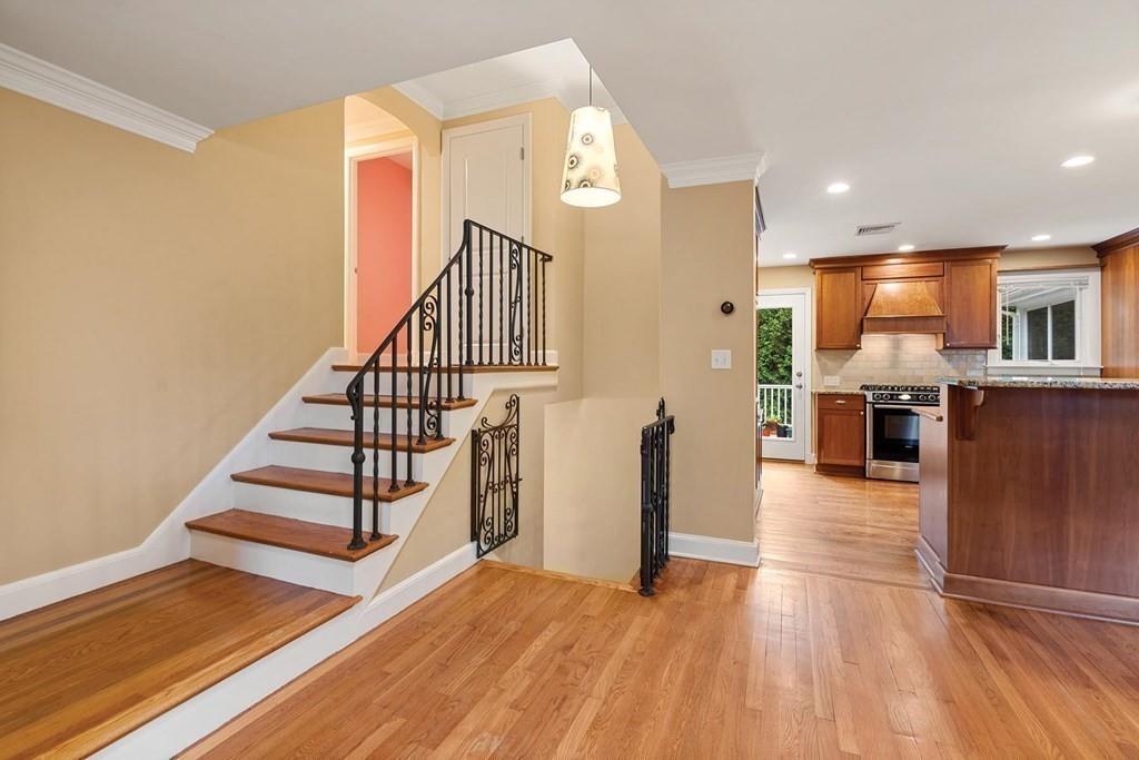 40 Helene Road Newton, MA 02468 - Photo 3 of 27 a view of a kitchen with furniture and wooden floor
