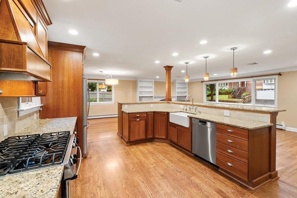 40 Helene Road Newton, MA 02468 - Photo 5 of 27 a large kitchen with lots of counter space and stainless steel appliances