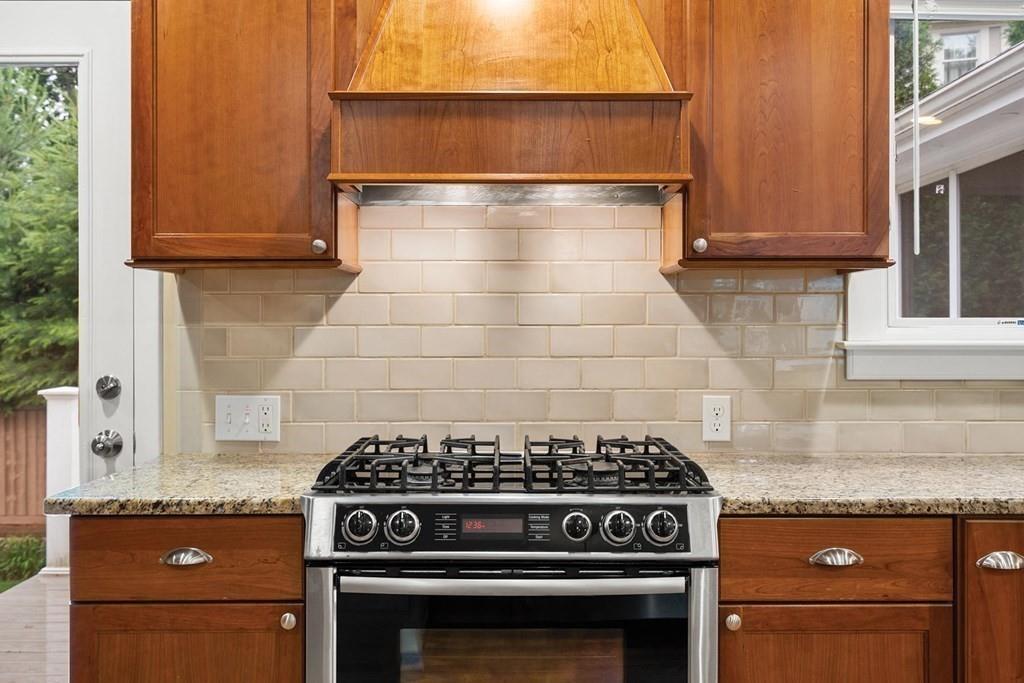 40 Helene Road Newton, MA 02468 - Photo 8 of 27 a stove top oven sitting inside of a kitchen