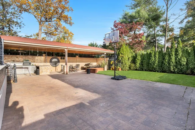 a view of a chairs and tables in the patio