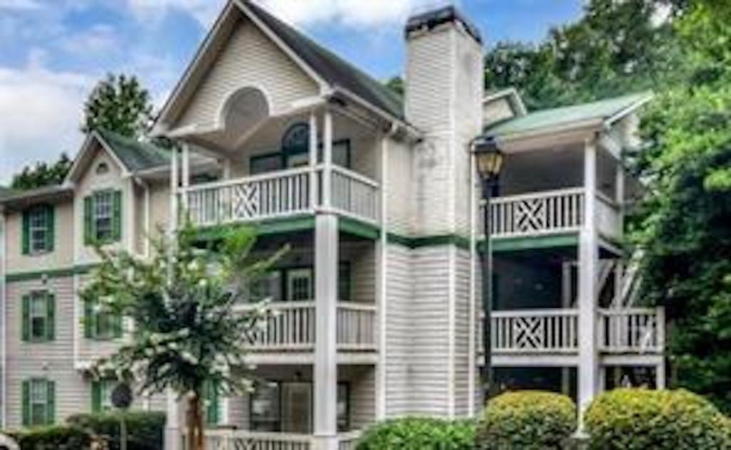 a front view of multi story residential apartment building