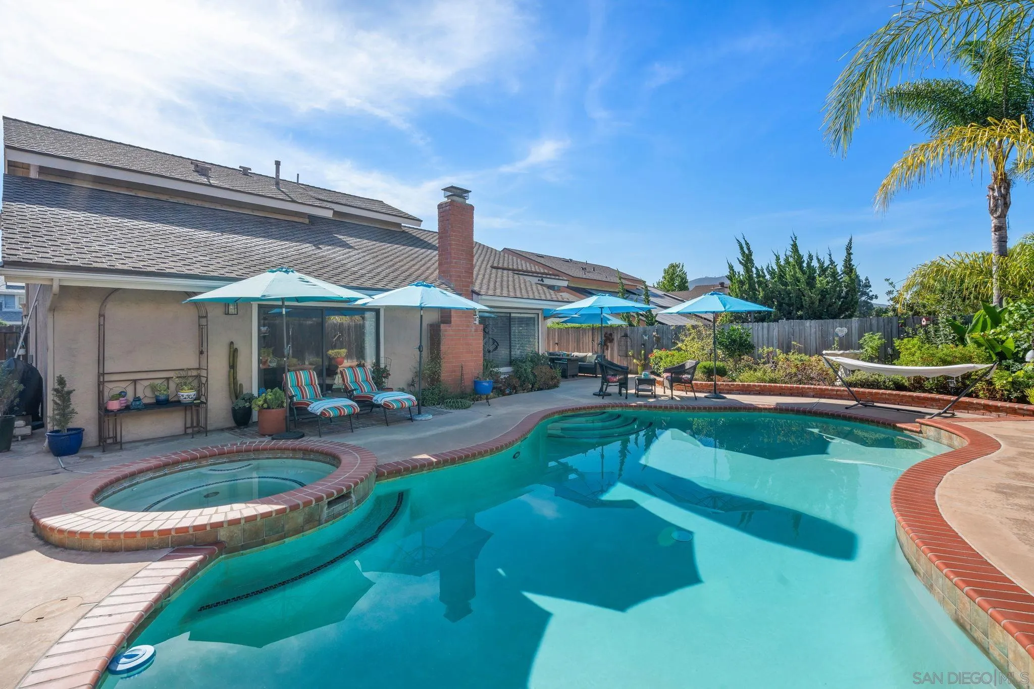 3544 Paseo Salamoner La Mesa, CA 91941 - Photo 1 of 45 a view of a house with swimming pool and sitting area
