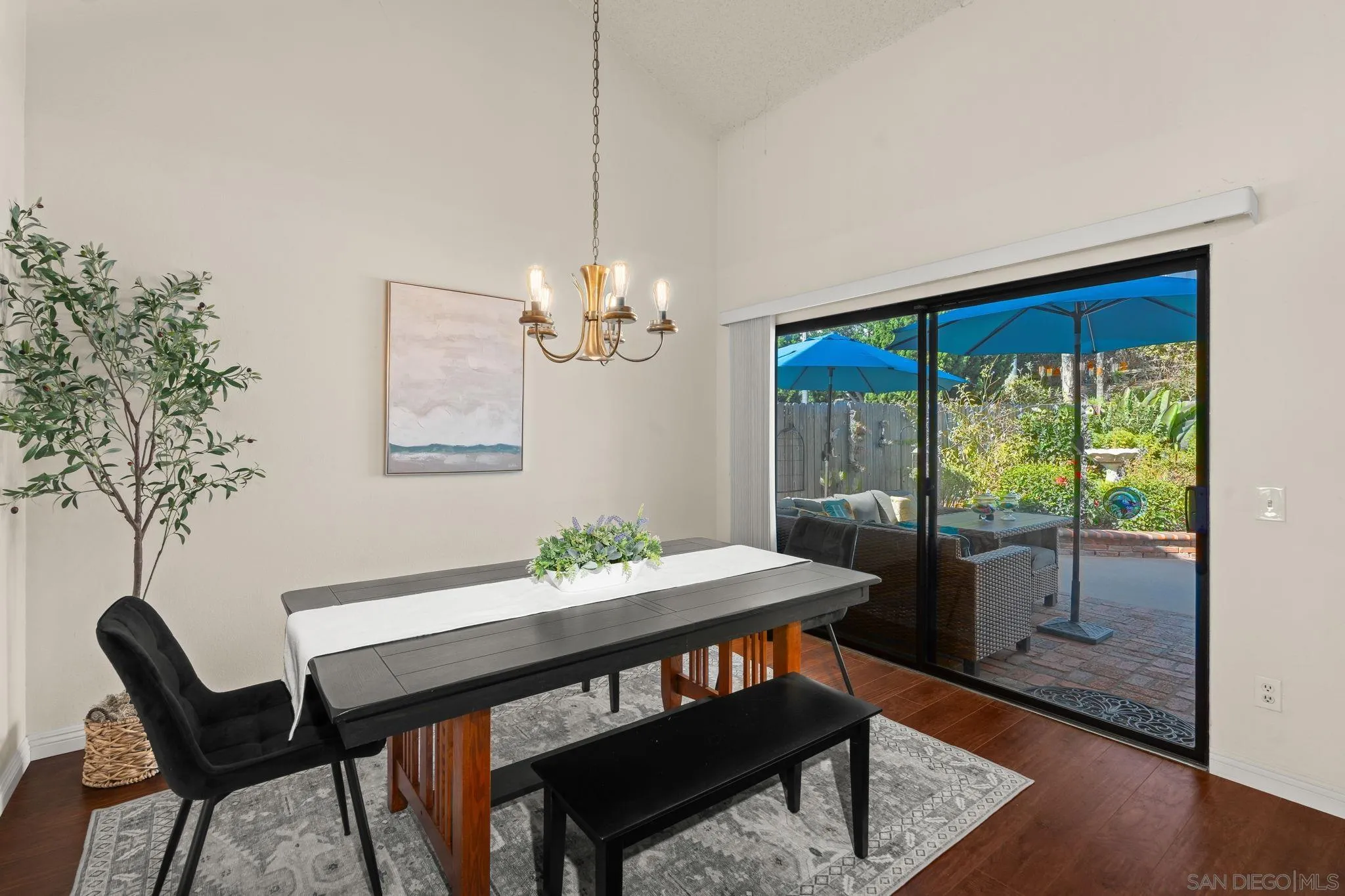 3544 Paseo Salamoner La Mesa, CA 91941 - Photo 11 of 45 a view of a dining room with furniture window and wooden floor
