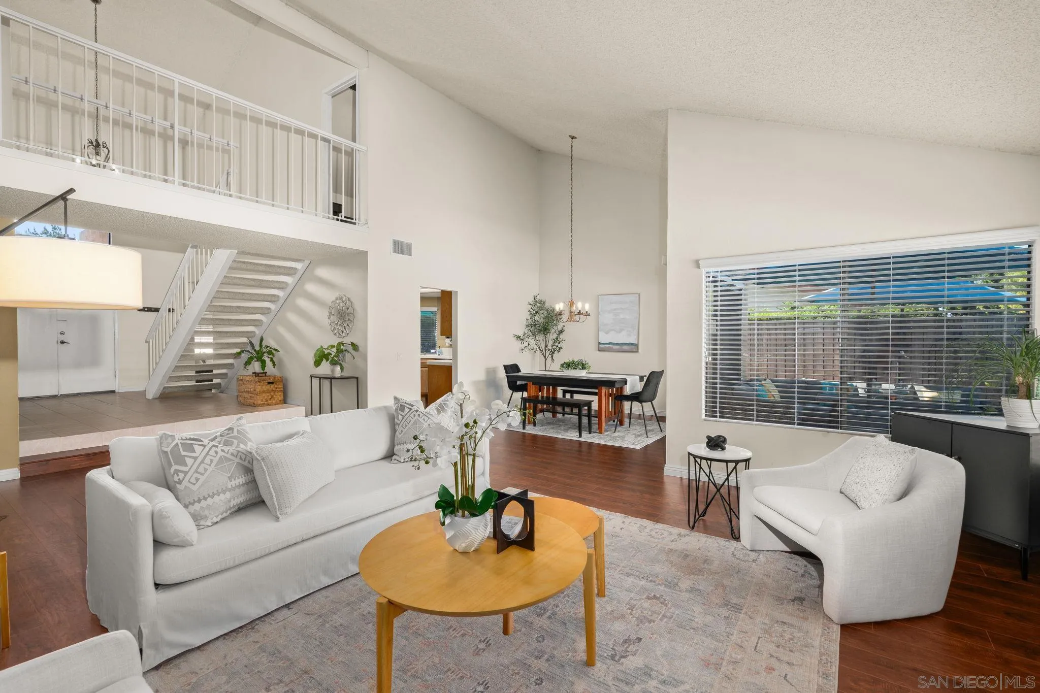3544 Paseo Salamoner La Mesa, CA 91941 - Photo 2 of 45 a living room with furniture and a large window