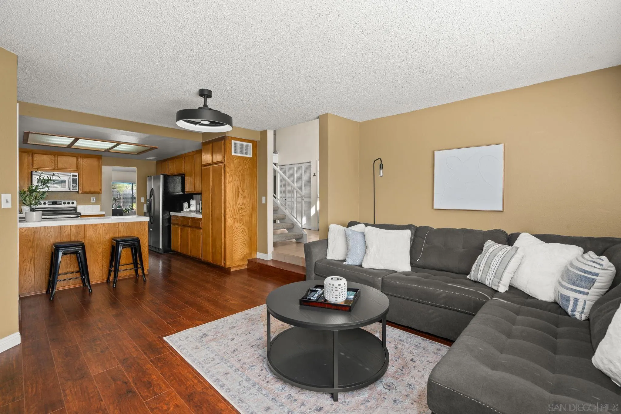 3544 Paseo Salamoner La Mesa, CA 91941 - Photo 21 of 45 a living room with furniture and wooden floor