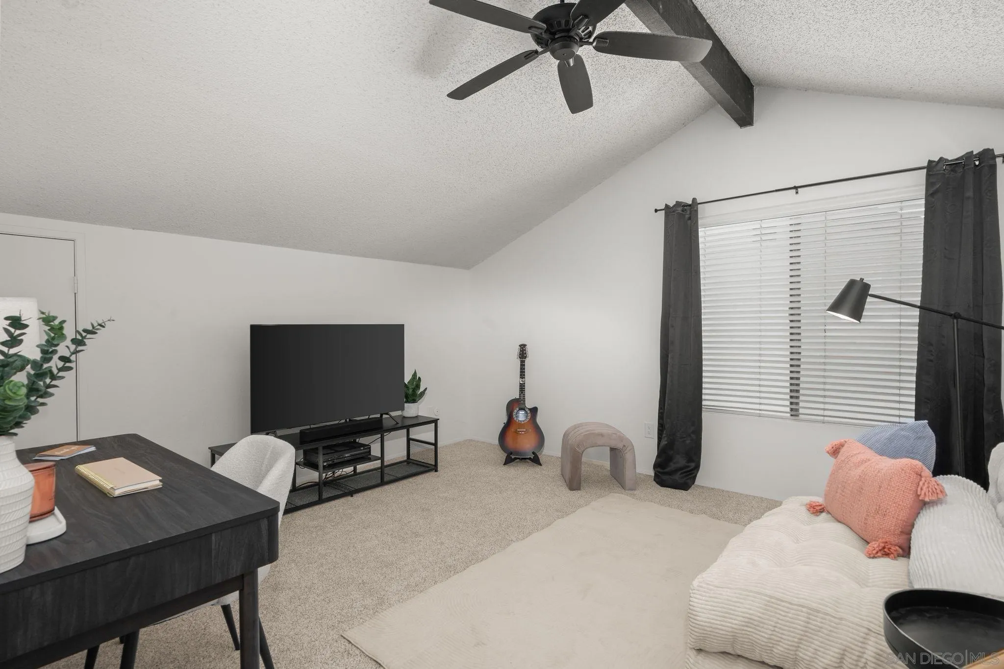 3544 Paseo Salamoner La Mesa, CA 91941 - Photo 40 of 45 a bedroom with a bed and a flat screen tv