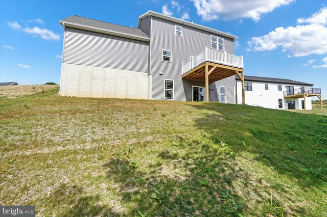 a front view of a house with yard