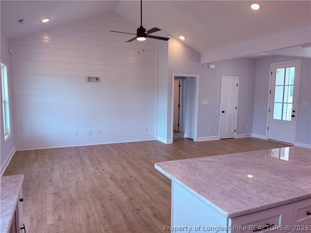 1075 Purdie-Hall Road Tar Heel, NC 28392 - Photo 16 of 28 wooden floor in an empty room with a window