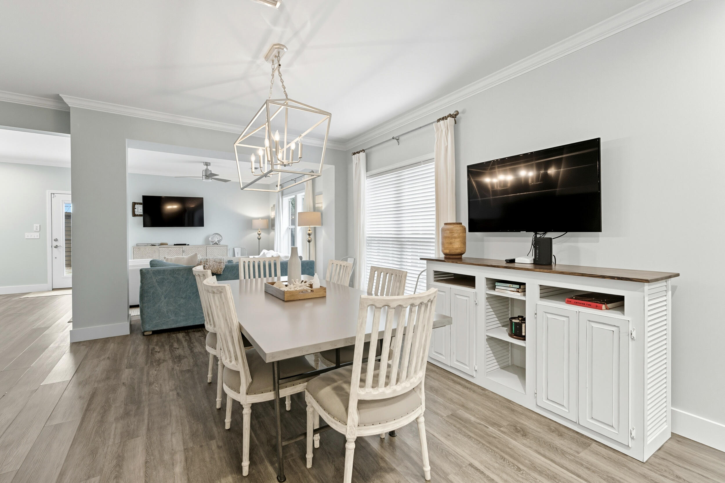 144 Hickory Street Santa Rosa Beach, FL 32459 - Photo 17 of 60 a view of a dining room with furniture and wooden floor