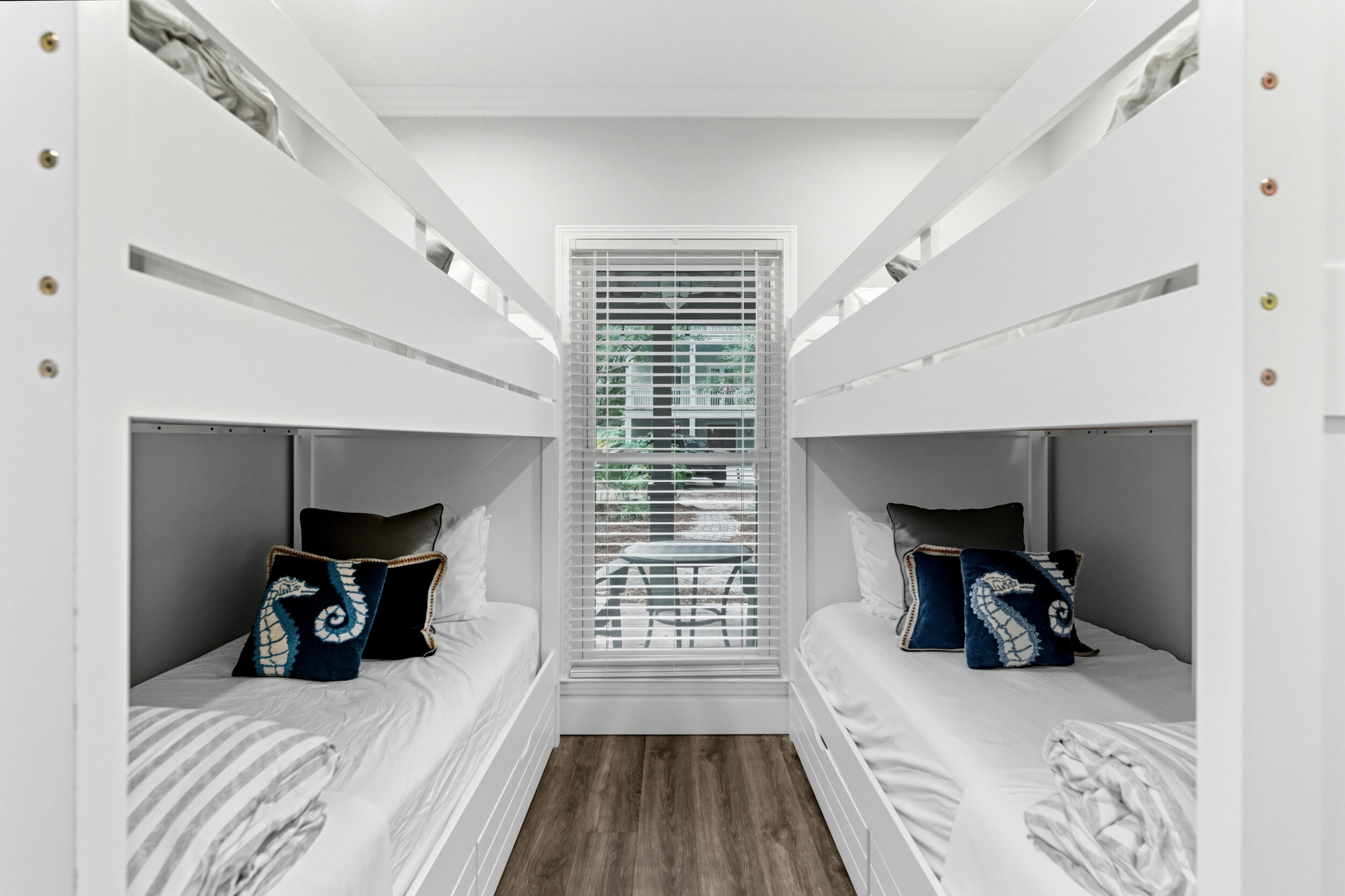 144 Hickory Street Santa Rosa Beach, FL 32459 - Photo 26 of 60 a bedroom with furniture and a window