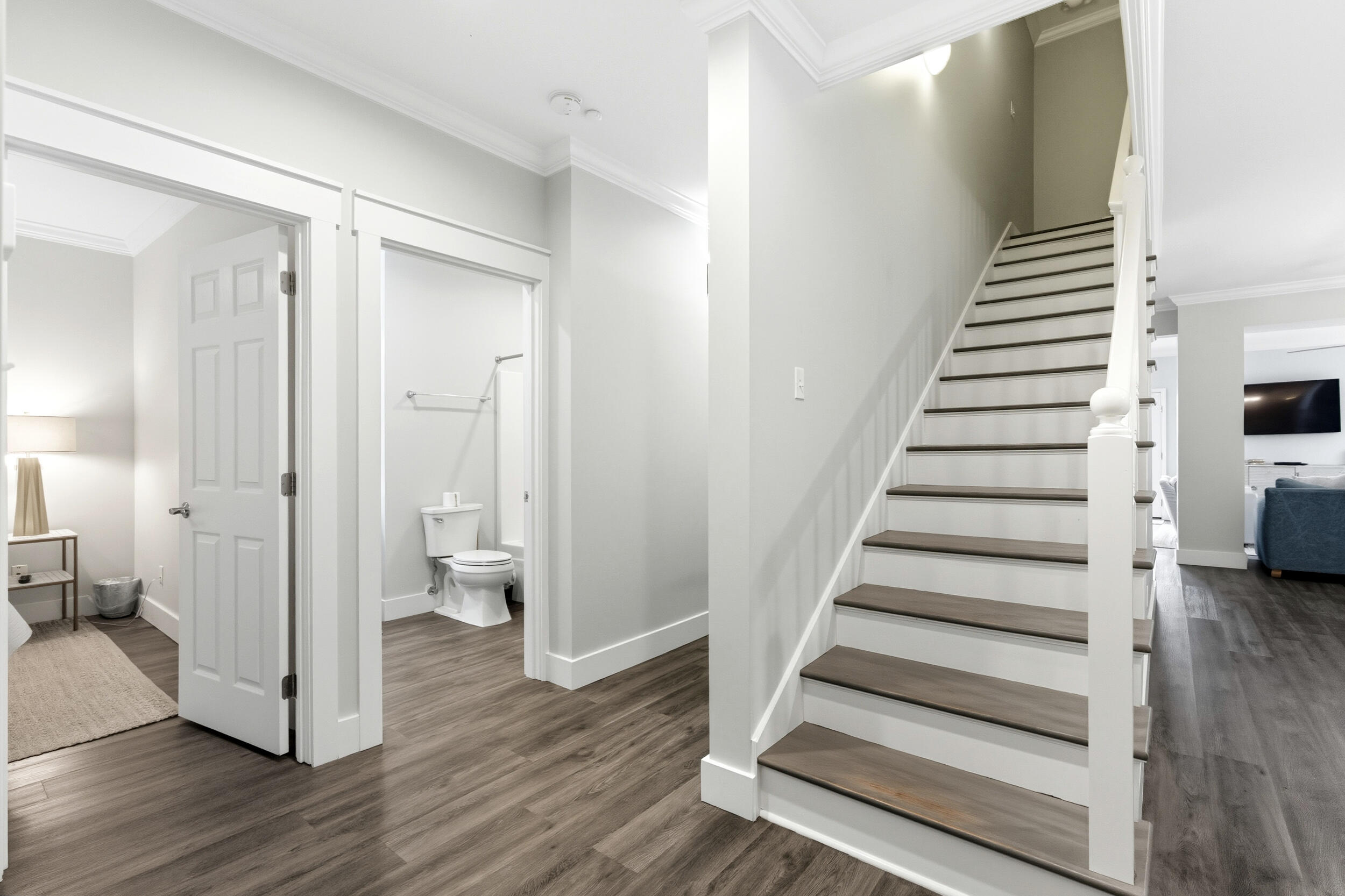 144 Hickory Street Santa Rosa Beach, FL 32459 - Photo 27 of 60 a view of a hallway with wooden floor and entryway